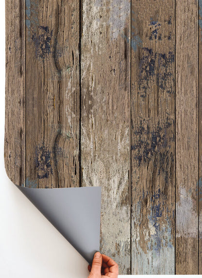 Sfondo fotografico per food photography in vinile con effetto legno rustico e vissuto, scolorito dal tempo con tratti colorati di vernice.