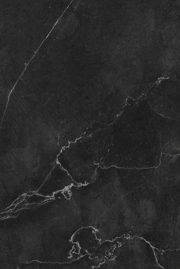 Sfondo fotografico rappresentante una lastra di marmo nero con una sottile venatura bianca che lo attraversa