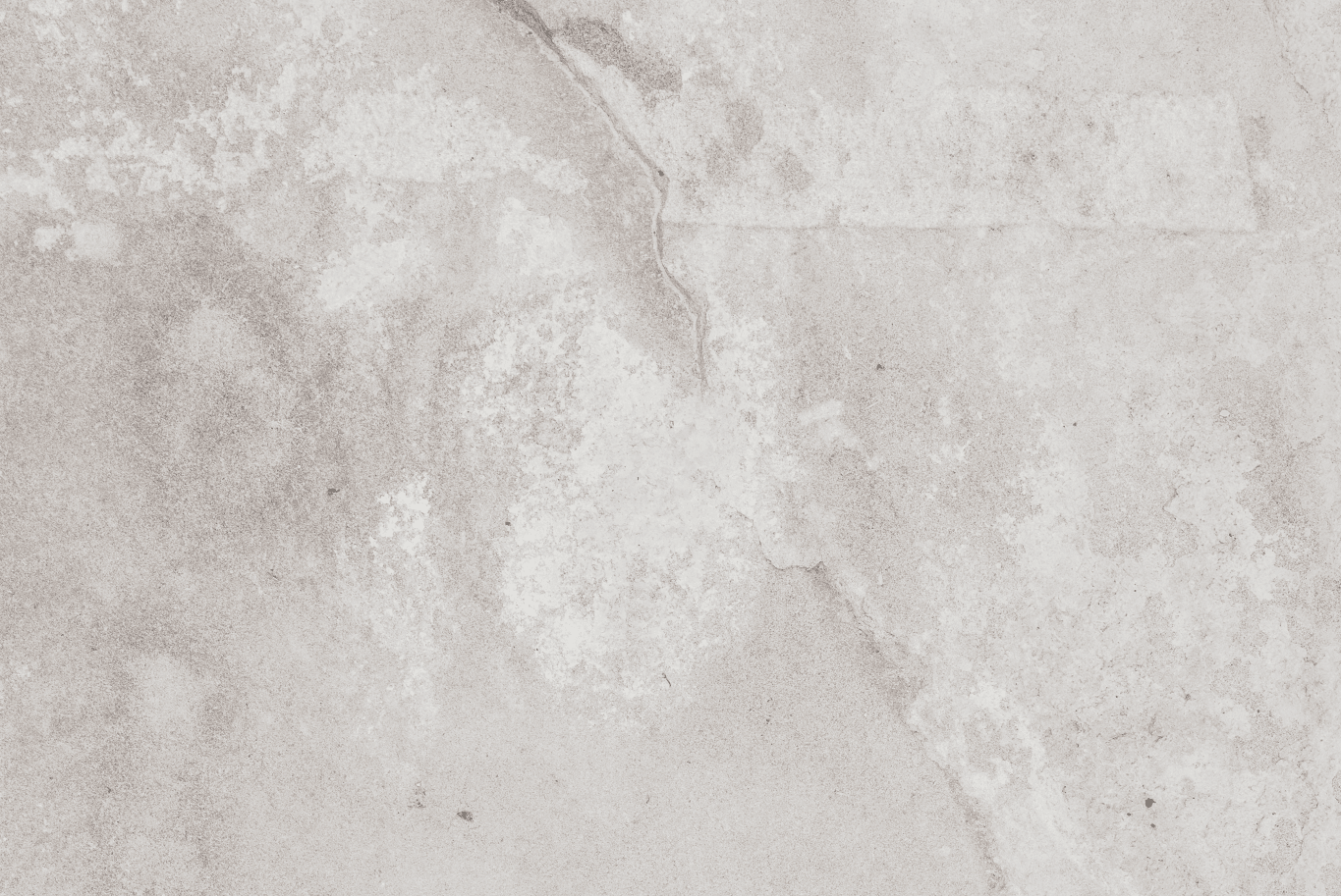 Sfondo Luna in vinile effetto pietra neutra, con venature e macchie tenui. Perfetto per set delicati e fotografia food.
