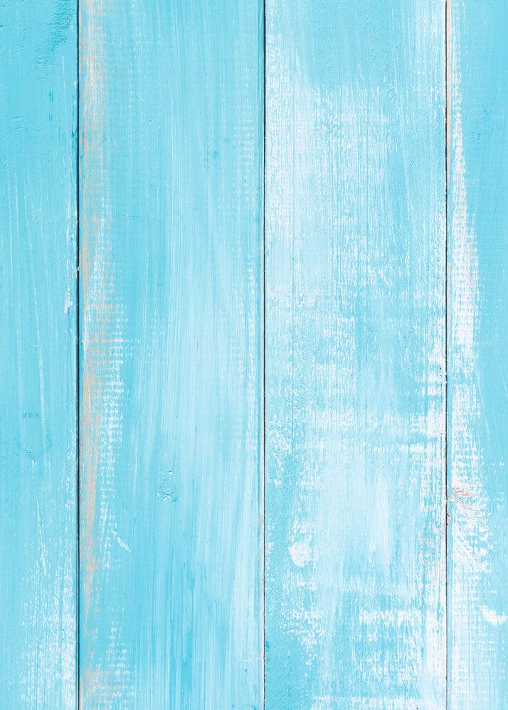 Legno azzurro a doghe verticali. Chiaro e rustico, dall'aspetto vintage e invecchiato. 