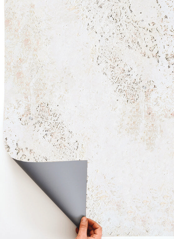 Sfondo fotografico Calcare in vinile, bianco con sfumature beige. Texture liscia e naturale, ideale per food photography.
