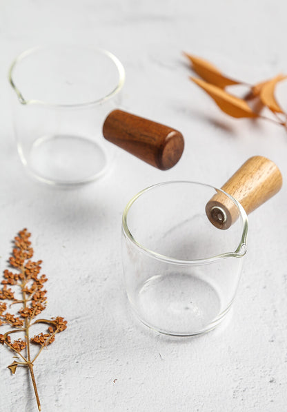 GLASS JUG WITH WOODEN HANDLE