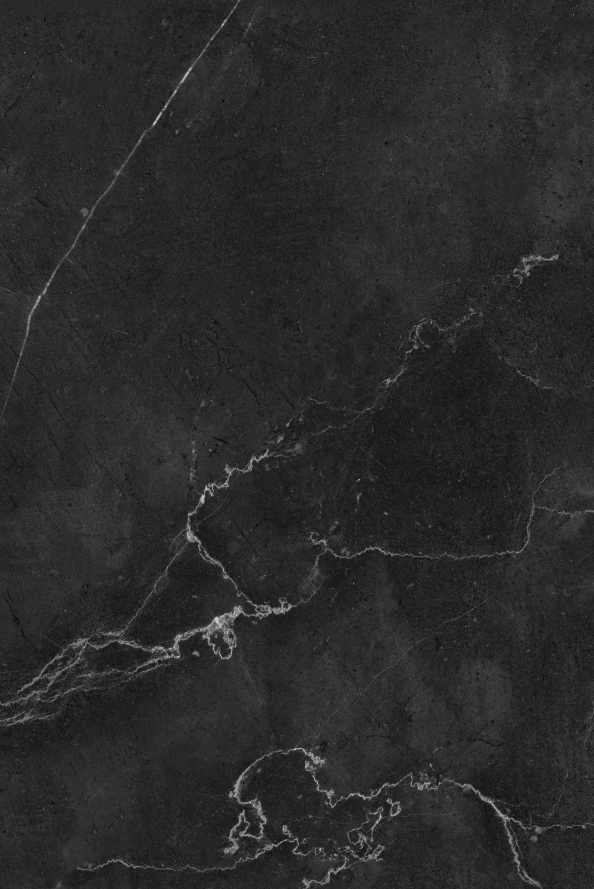 Sfondo fotografico rappresentante una lastra di marmo nero con una sottile venatura bianca che lo attraversa